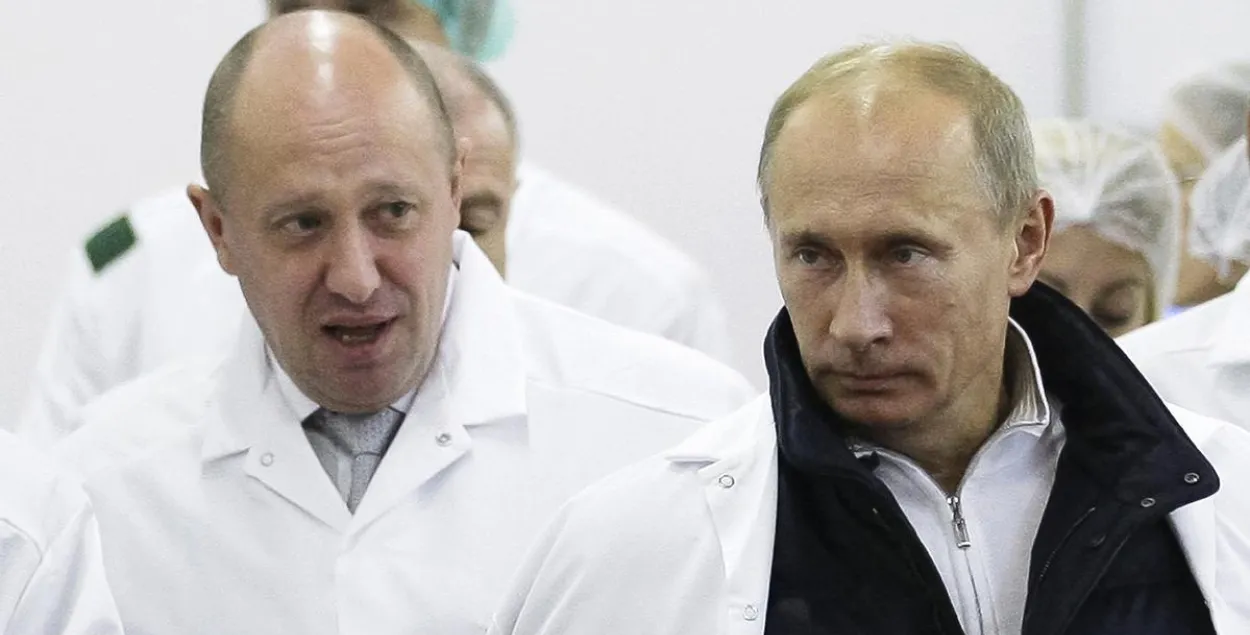 Евгений Пригожин (слева) и Владимир Путин / DW
