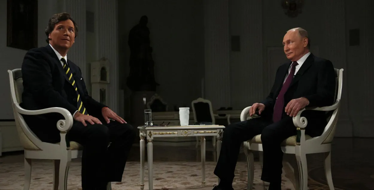 Такер Карлсан і Уладзімір Пуцін
