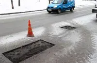 Зимой в Минске пытаются ремонтировать дороги / БЕЛТА
