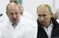 Евгений Пригожин (слева) и Владимир Путин / DW
